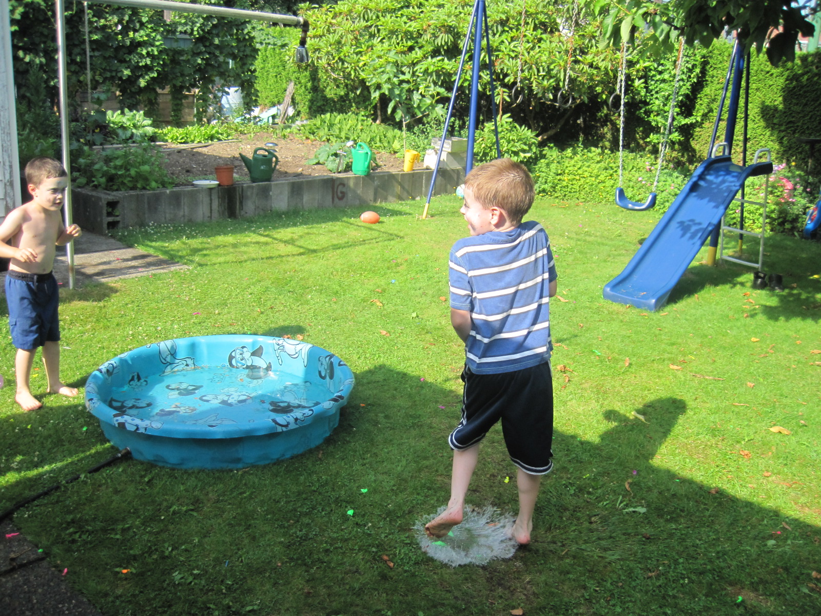 This shot captures the moment of water balloon impact at Arlo's feet. Cool, huh?